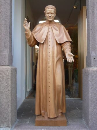 Statua di San Giovanni Bosco in legno naturale