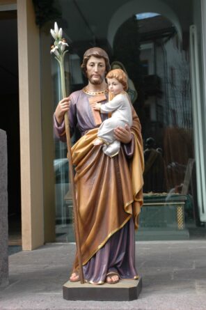 Statua viola in legno di San Giuseppe con bambino