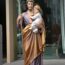 Statua viola in legno di San Giuseppe con bambino